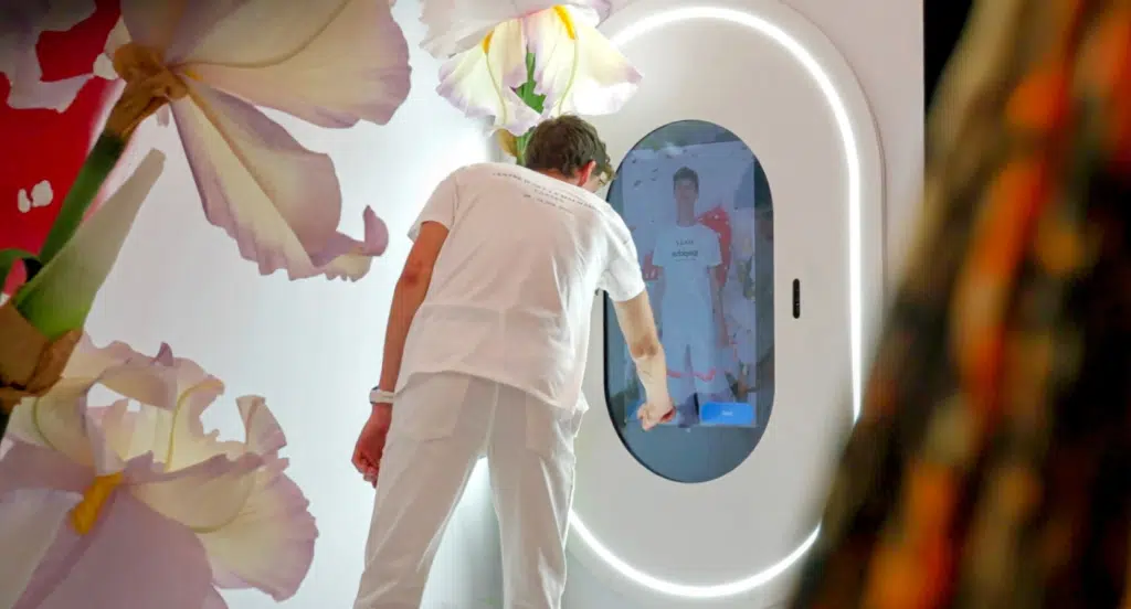 Customer looking in interactive Snap mirror